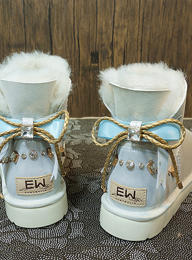 新款冬季短筒真皮羊毛一体防水雪地靴蝴蝶结水钻女靴防滑底33A-4