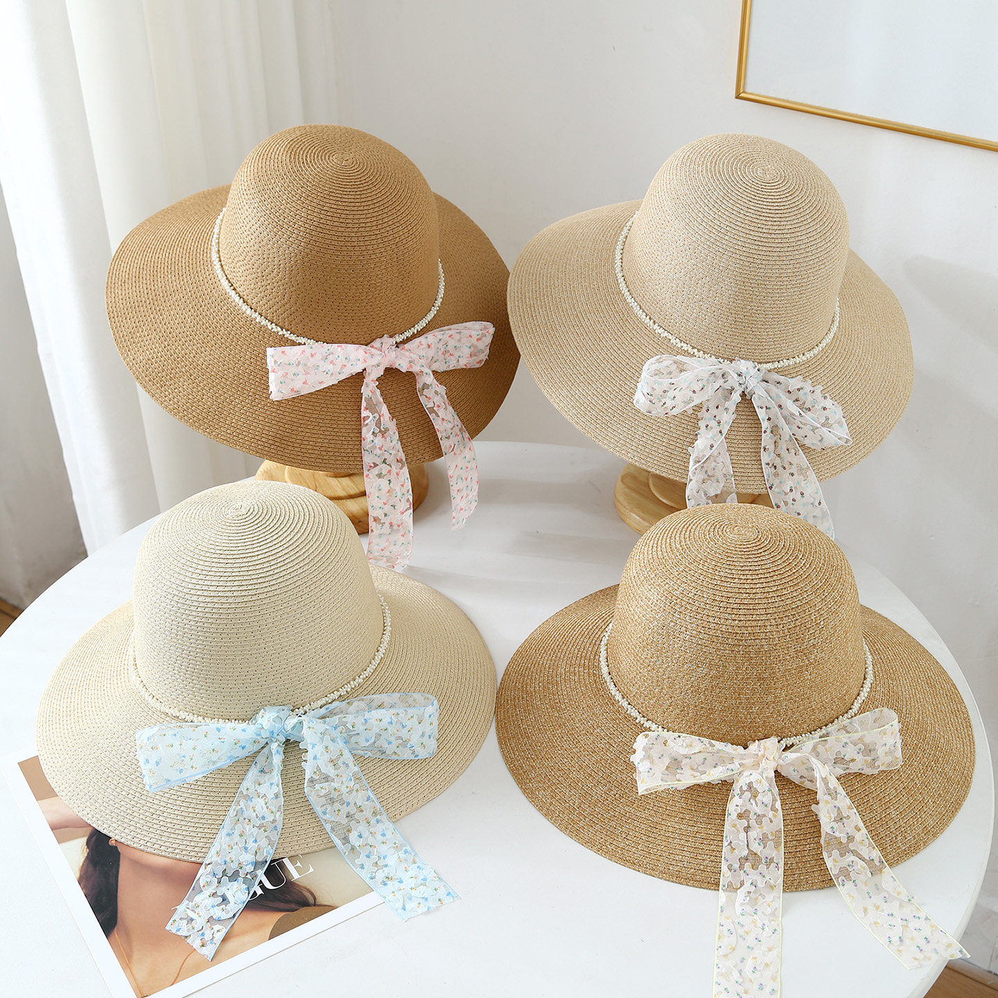 宽檐草帽女夏季蝴蝶结珍珠装饰大檐防晒遮阳帽旅行度假帽碎花飘带