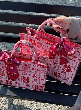 红色婚包女2026新款时尚手提新娘包高级感单肩通勤包大容量托特包