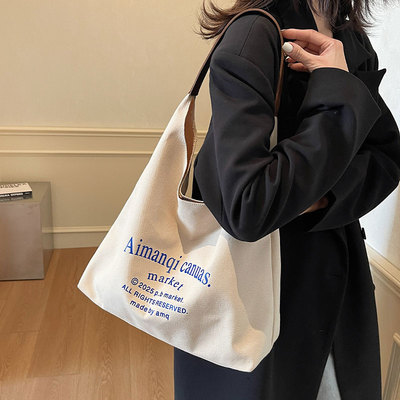 小众腋下单肩包女字母帆布包