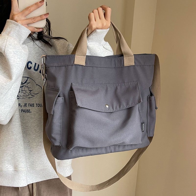 加厚多口袋日系帆布包女2025新款休闲大容量学生手提单肩斜挎书包