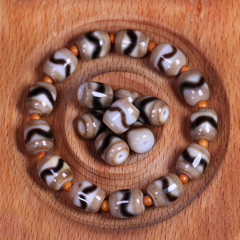 圣饰奇缘 西藏天然玛瑙糯肉虎牙天珠手串配珠配饰9*11mm左右