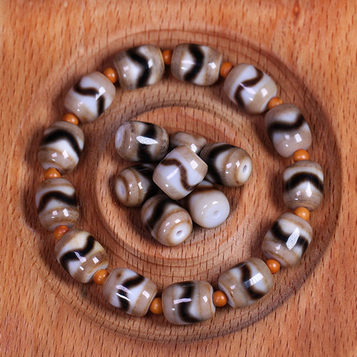 圣饰奇缘 西藏天然玛瑙糯肉虎牙天珠手串配珠配饰9*11mm左右