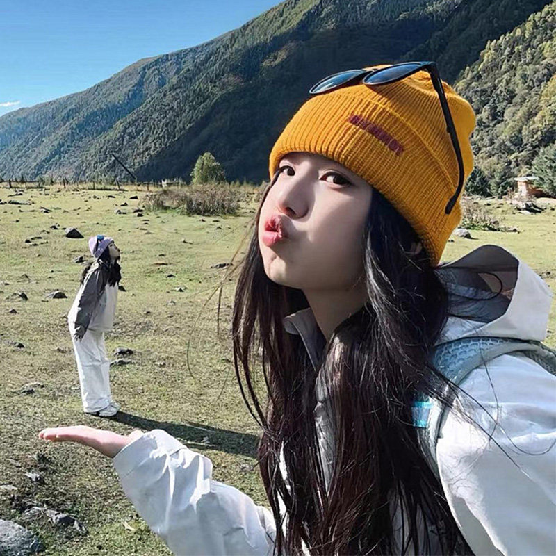 川西旅游登山小黄帽子女冬季户外