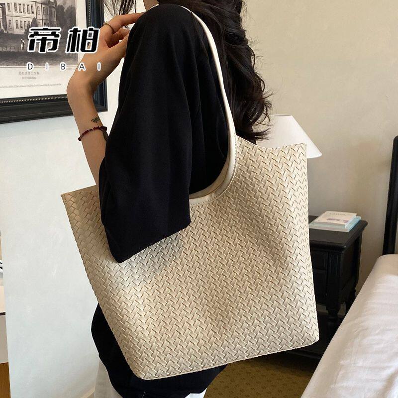 黑色编织包托特包女大容量2026新款通勤单肩包百搭皮包
