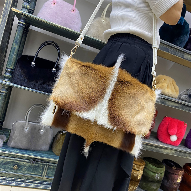 王冠皮草布袋包跳羚羊信封包轻奢