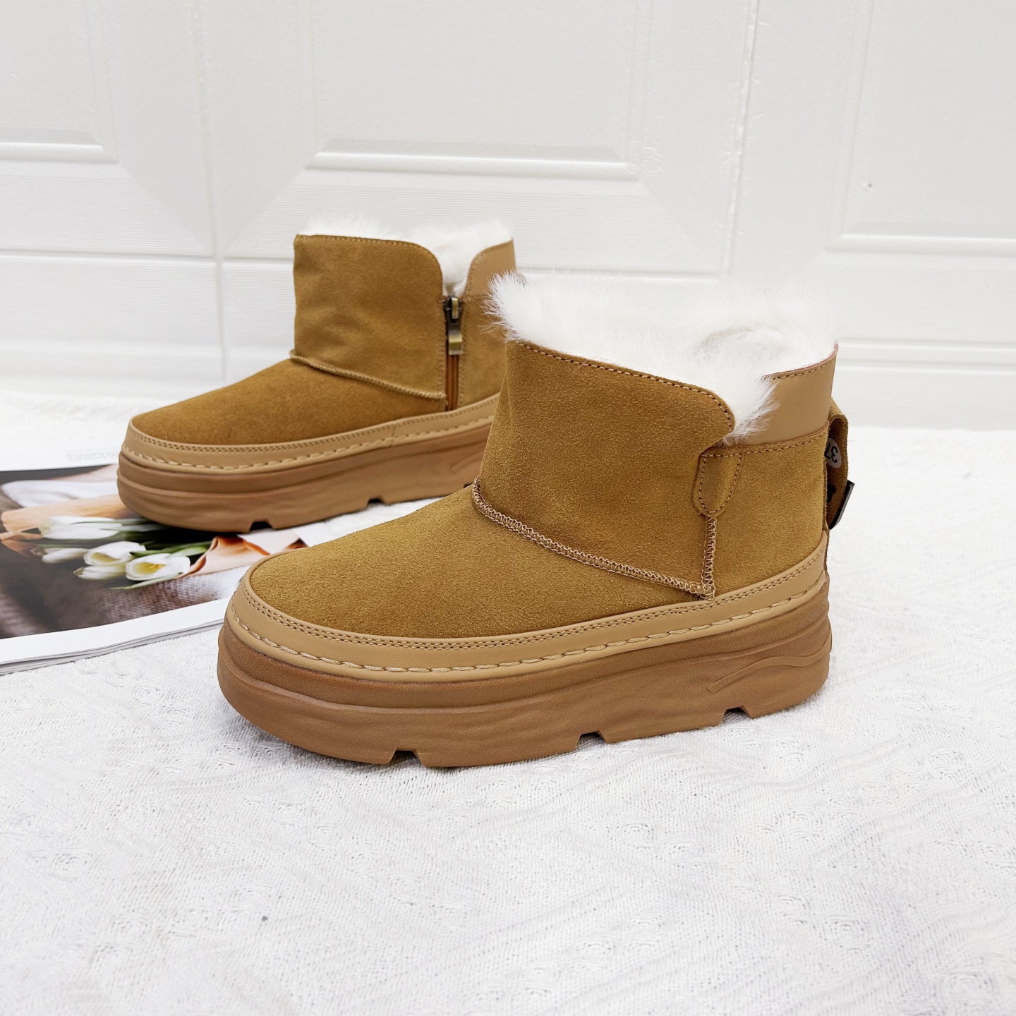 女士冬季真皮加绒厚底增高雪地鞋