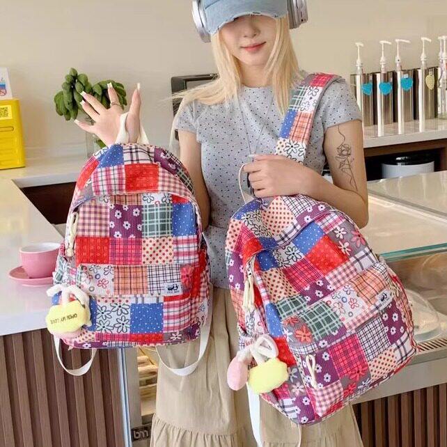民族风双肩包女2025新款彩色碎花背包妈咪包小众设计学生迷你书包
