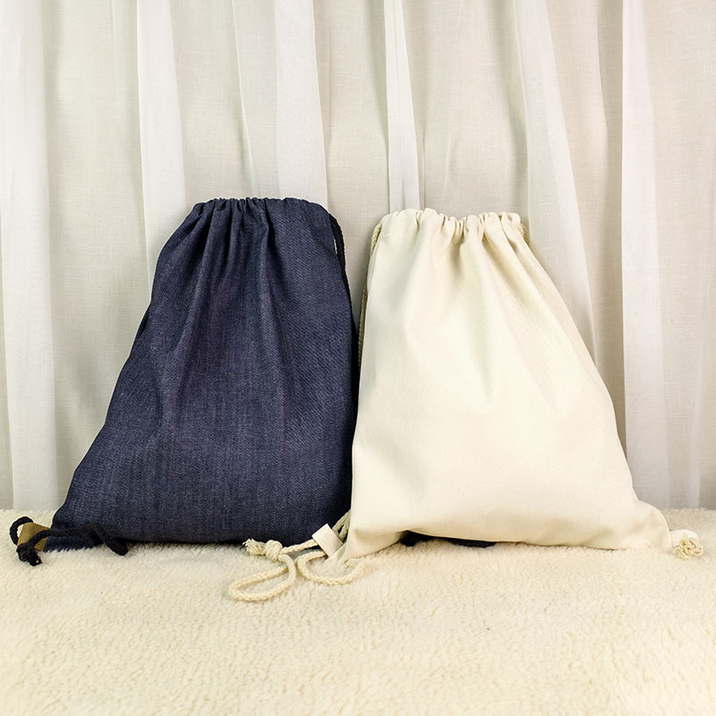 简易个性款牛仔布学生排球篮球抽绳束口大容量双肩运动爬山背包