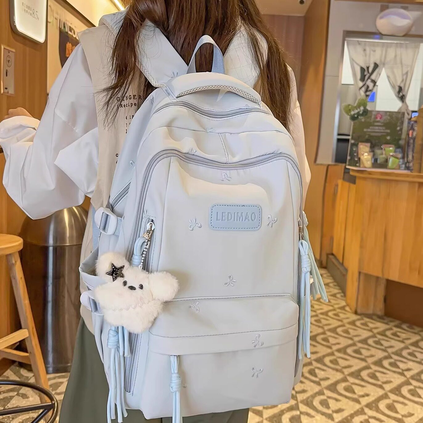 新款时尚减负书包女生小学生大容量初中生高中生多层轻便双肩背包