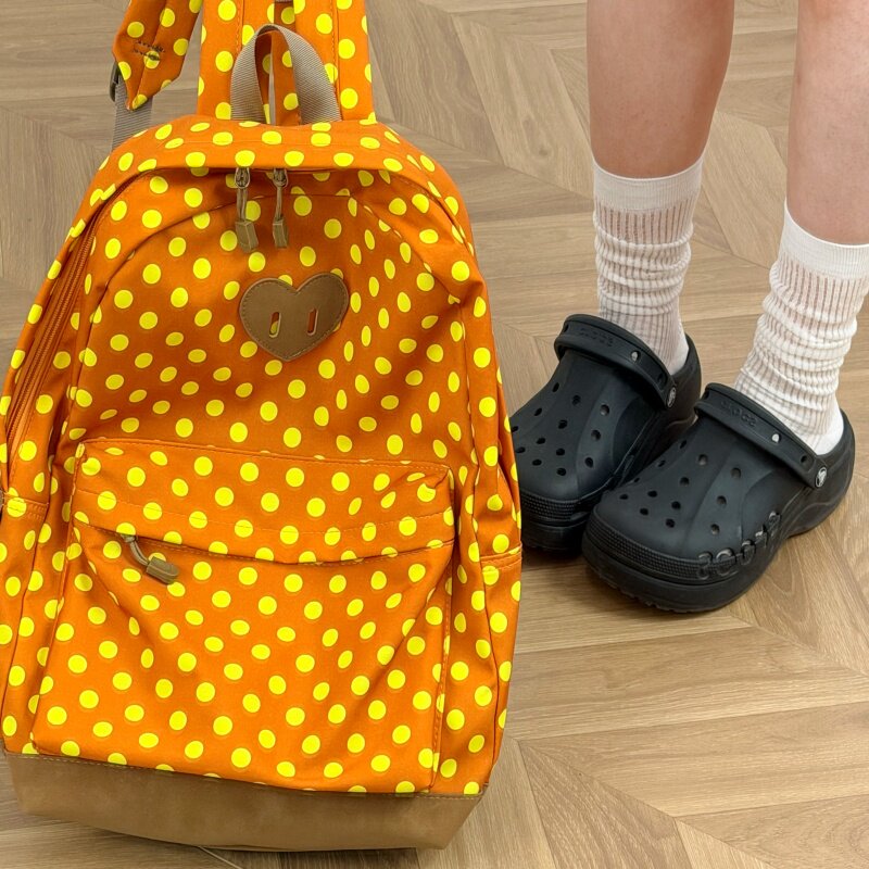 高中生学院风橙色波点双肩包女校园少女风高颜值大容量学生书包潮