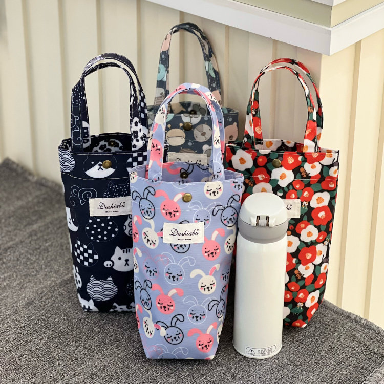 新款韩版防水手提水杯袋奶瓶袋焖烧杯雨伞包零钱钥匙手机手提袋包,餐饮具,杯套,淘宝优惠券,粉丝福利购,淘宝优惠卷
