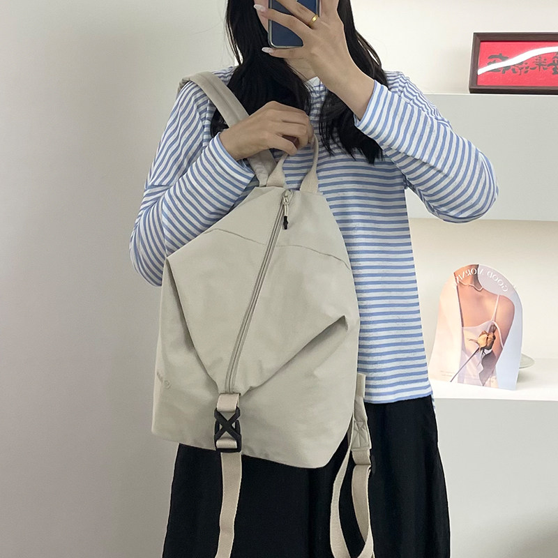 时尚小众设计感双肩包女轻便大容量帆布尼龙运动背包休闲旅行书包