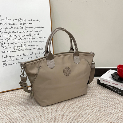 尼龙帆布包包女单肩斜挎手提包2025新款轻便时尚通勤包牛津布女包