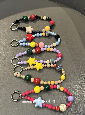 电镀红色新年款珠子蝴蝶结毛球毛绒秋冬串珠百搭ccd相机钥匙扣女