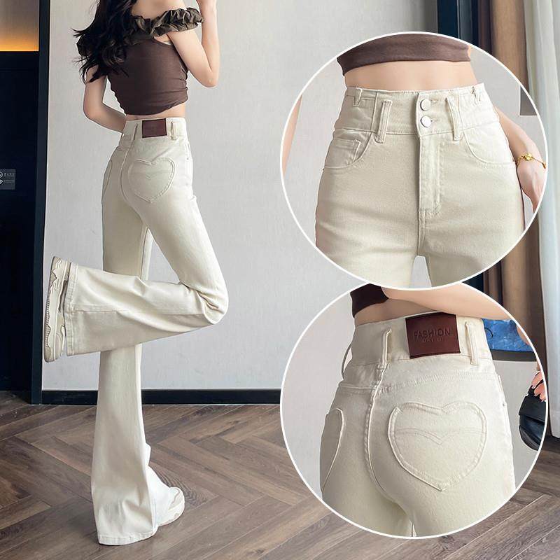 米白色美式蜜桃臀微喇牛仔裤女2025夏薄款设计感弹力提臀马蹄裤子