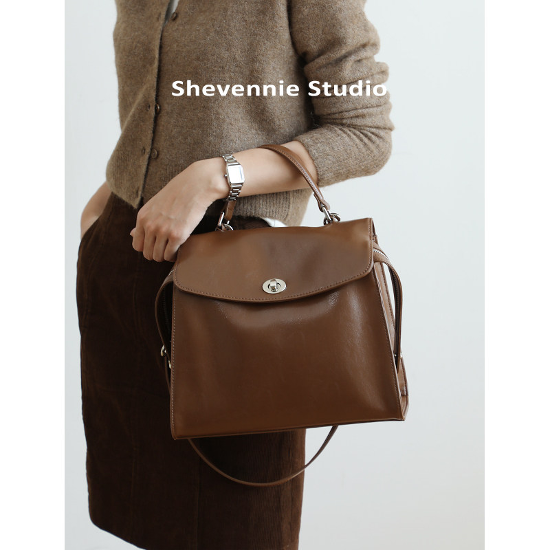 shevennie金属扣牛皮手提单肩包