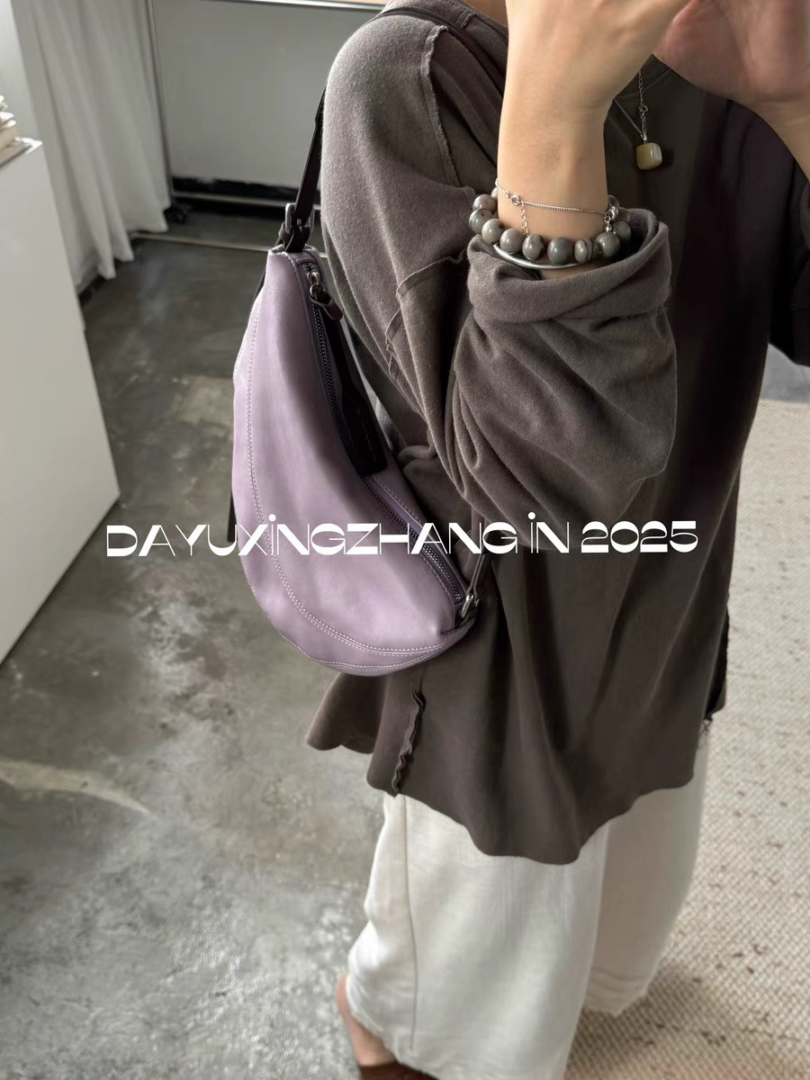 2025新款小众设计紫西梅马鞍包包单肩斜挎手提包牛角包饺子包包女