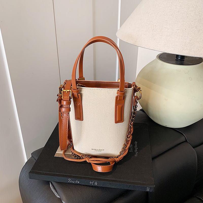 LAOYJA通勤百搭休闲撞色水桶包潮