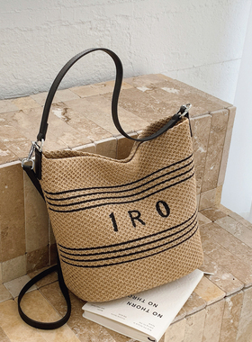 小众设计包包女式2025新款超火编织沙滩草编包百搭单肩斜挎水桶包
