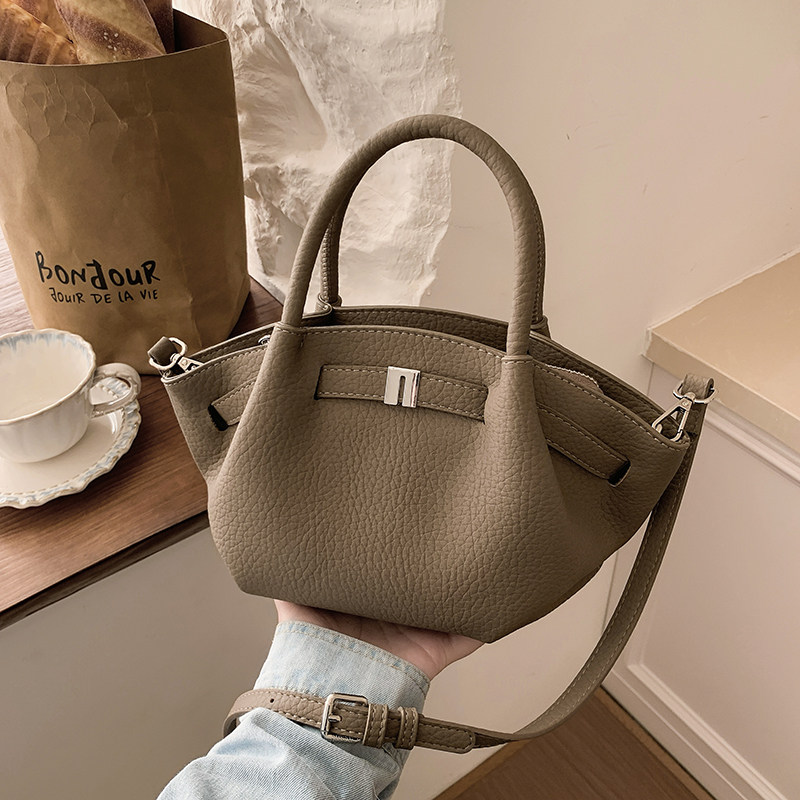 今年流行爆款包包女式2026新款超火小众手提翅膀包百搭单肩斜挎包