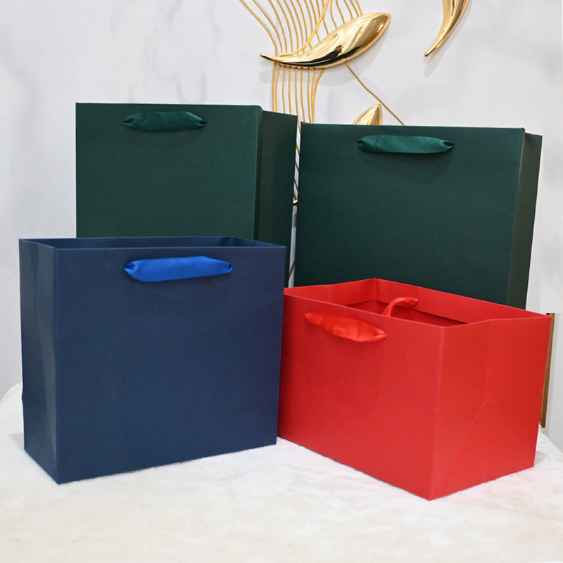 绿色卡纸服装绿色黑色纸袋商务礼品袋高档沉稳袋子送礼手提袋低调