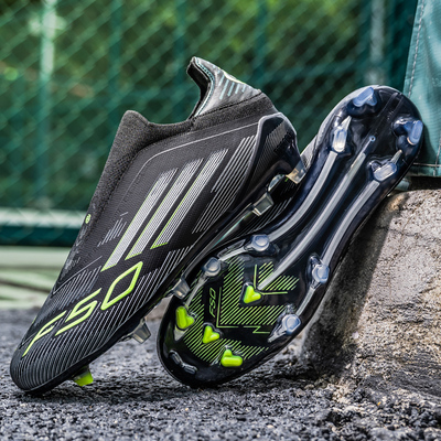 F50黑绿无鞋带足球鞋男女成人学生FG长钉TF碎钉猎鹰人造草地训练
