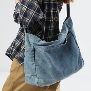 斜挎包休闲简约旅行单肩包男女大容量水洗牛仔布运动学生装书背包