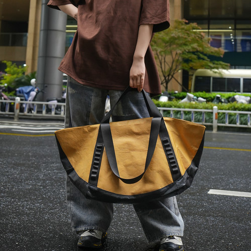 简约风旅行包男女通用大容量休闲手提包青年出差包防水PU皮单肩包