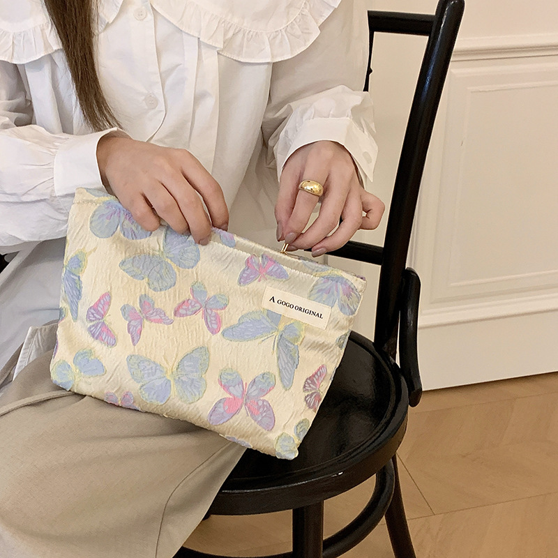 ins蝴蝶化妆包立体面料护肤品收纳包便携式零钱包旅行手拿小包