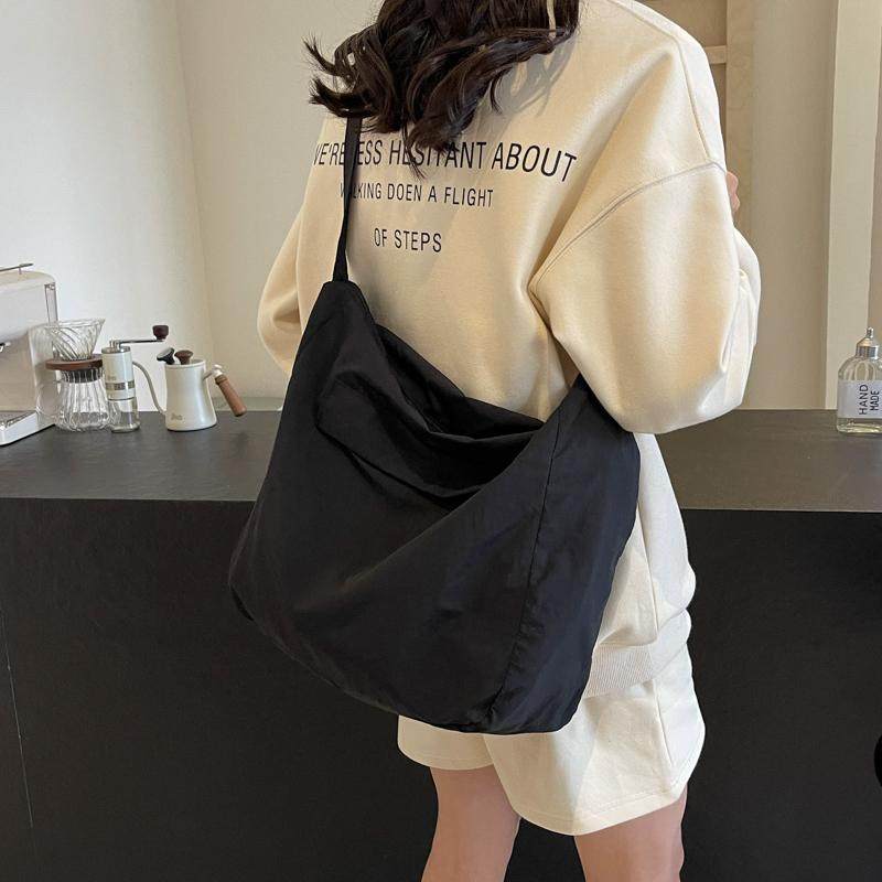 斜挎包女大容量轻便邮差包休闲简约旅行包百搭单肩学生韩版背包男,箱包皮具/热销女包/男包,时尚帆布包,淘宝优惠券,粉丝福利购,淘宝优惠卷