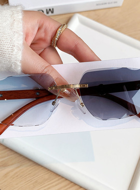 欧美时尚新款无框切边变色太阳镜时尚街拍高级感墨镜木纹腿潮眼镜