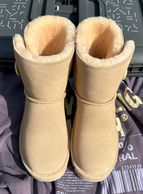 防水真皮中筒纽扣雪地靴女牛皮雪地棉鞋防滑高帮冬季加厚百搭短靴