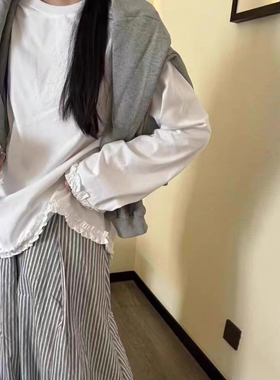 春秋白色温柔木耳边下摆不规则棉T女设计感宽松慵懒圆领长袖上衣