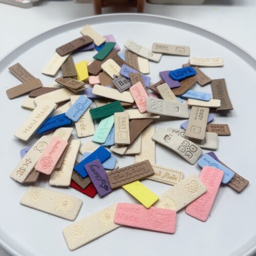 S04约2.5-4CM各种款式皮标 95-105个diy手工材料配件满30包邮