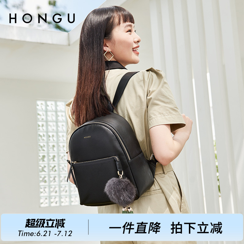 红谷真皮双肩包女士新款潮牛皮时尚毛球背包软皮大容量休闲旅行包