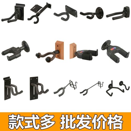 小提琴吉他挂钩墙壁上民谣电贝斯