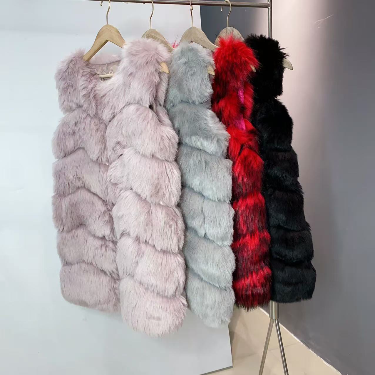 纳兰熏圆领横排仿狐狸毛毛狐貂绒中长款环保毛毛皮草外套女2025新