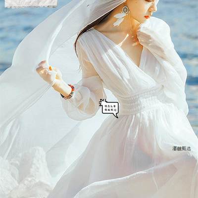 三亚沙滩裙女夏海边度假超仙气白色连衣裙飘逸长裙拍油菜花的裙子