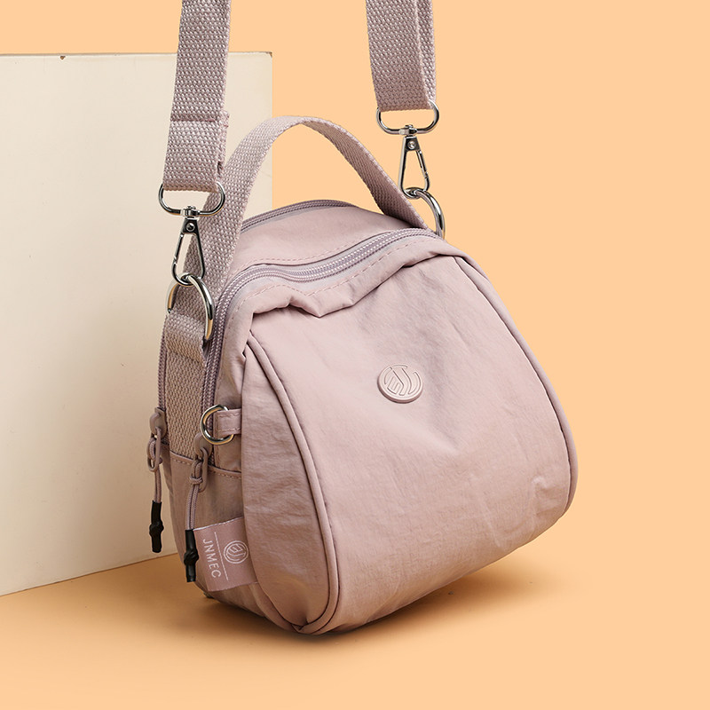 女士单肩休闲简约风斜挎包轻便手提包时尚百搭贝壳包中老年小背包