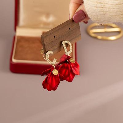 不对称CD字母红花瓣蚊香盘耳夹