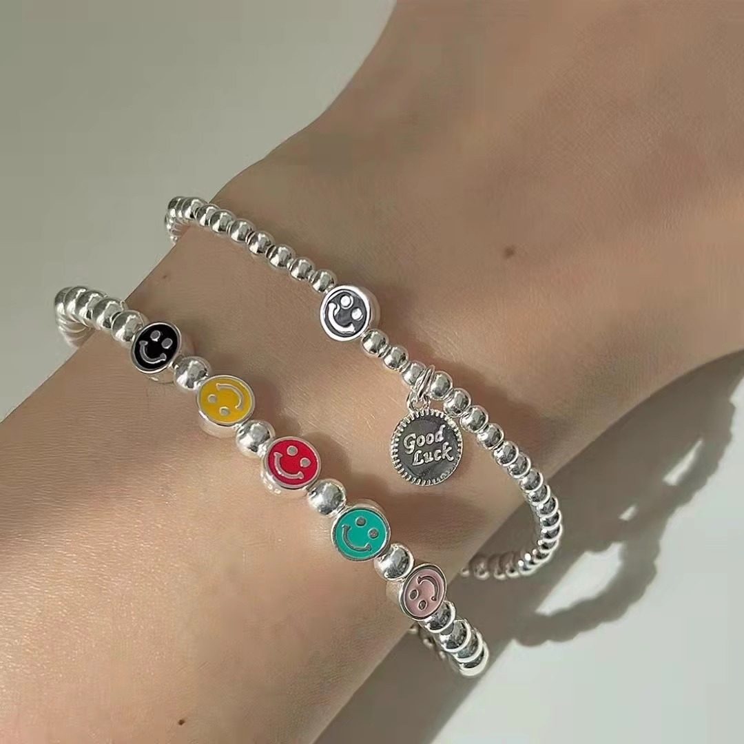 小清新女生手串S925纯银简约小众彩色滴釉笑脸字母圆牌弹力绳手链,饰品/流行首饰/时尚饰品新,手链,淘宝优惠券,粉丝福利购,淘宝优惠卷