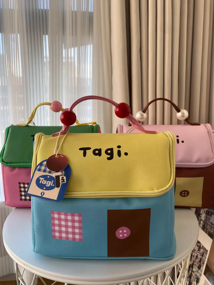 Tagi.机灵小房子防水皮质便携洗漱包大容量相机收纳袋手提化妆包图片
