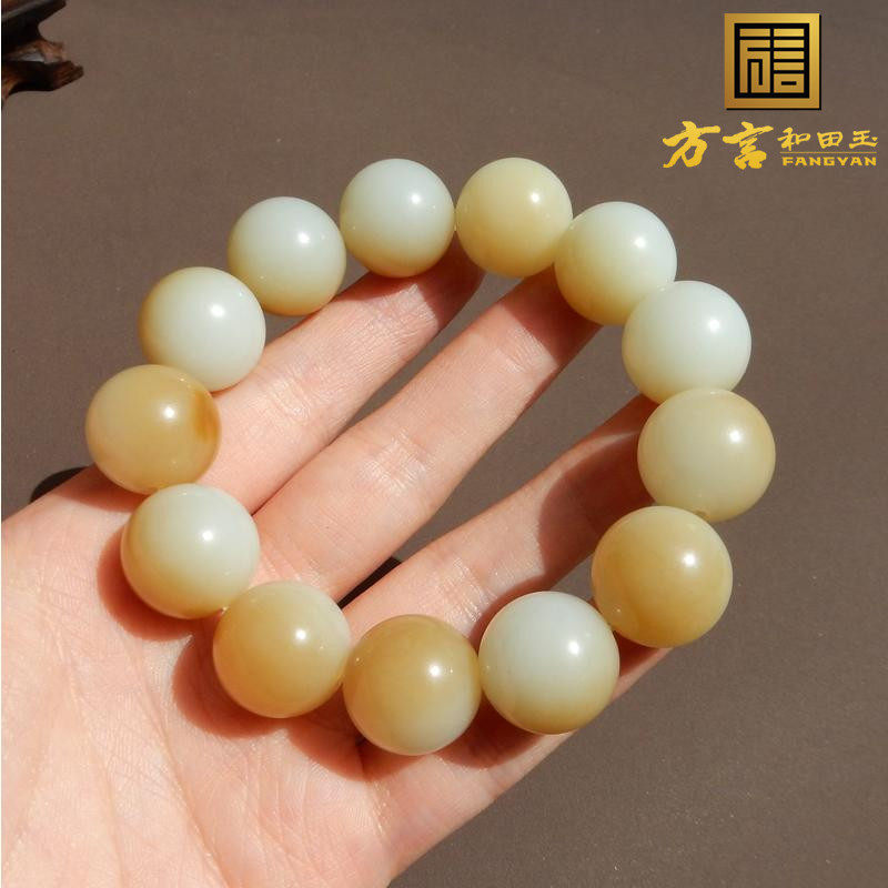 俄罗斯羊脂白玉带糖14mm圆珠手串