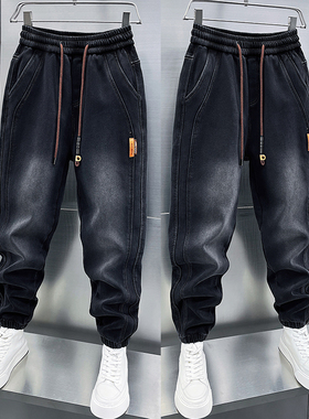 男士秋冬季加绒黑灰色牛仔裤松紧腰拼接小脚裤潮牌弹力束脚哈伦裤