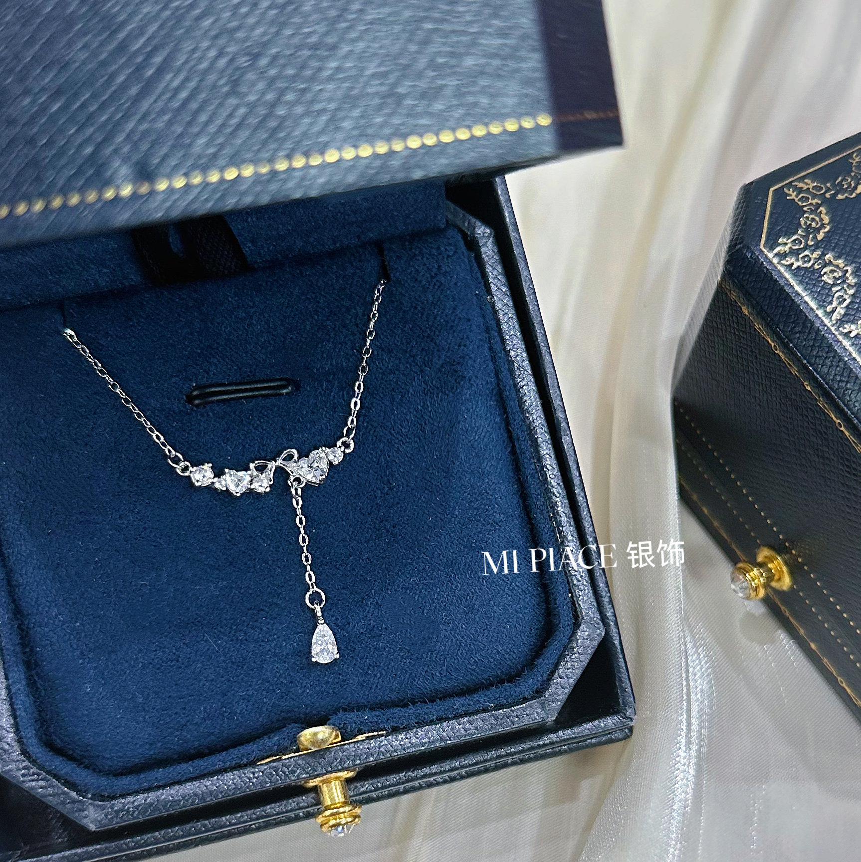 s999纯银爱心蝴蝶结项链女小众设计感流苏锁骨链送闺蜜生日礼物