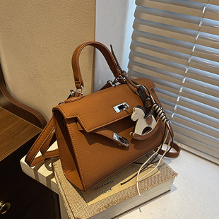 轻奢凯莉包女2025新款高级感锁扣手提斜挎包小众单肩包结婚红色包