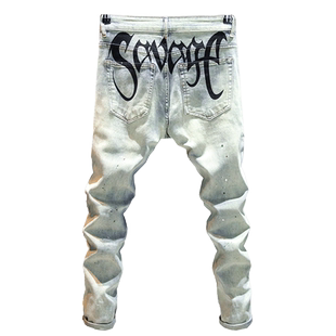 高街泼墨设计牛仔裤男款潮牌个性印花修身长裤2025百搭休闲小脚裤