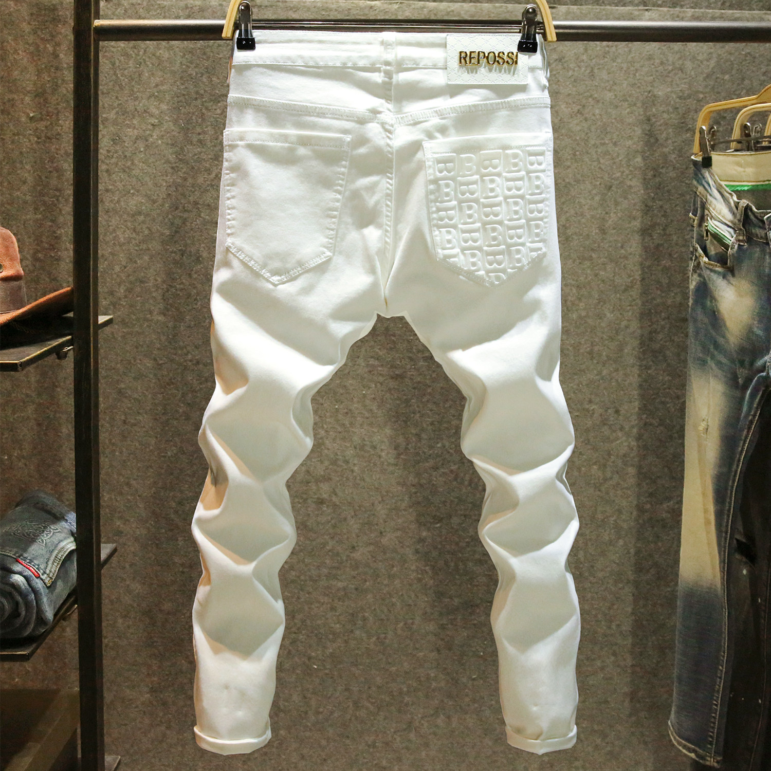 白色轻奢牛仔裤男款2025夏季修身小脚裤高端大牌立体印花休闲长裤