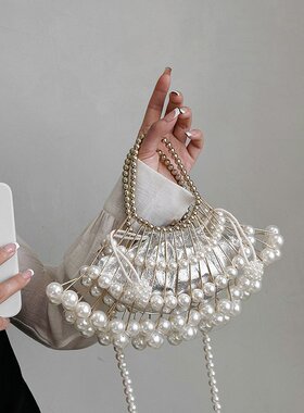 手工编织扇形贝壳包女2026新款镂空手提晚宴包珍珠链条单肩斜挎包